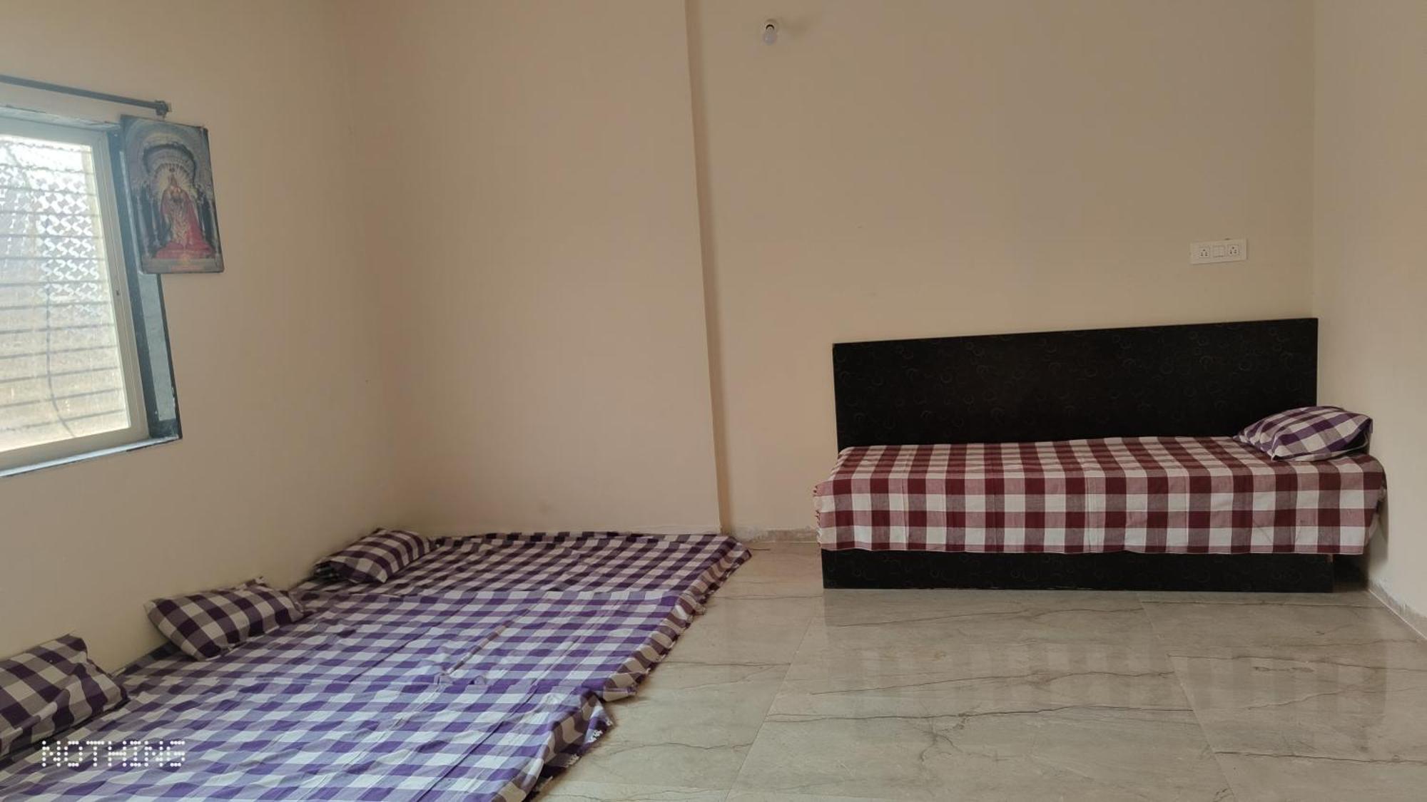 Aadishkti Bhakt Nivas Hotel Tuljapur Quarto foto